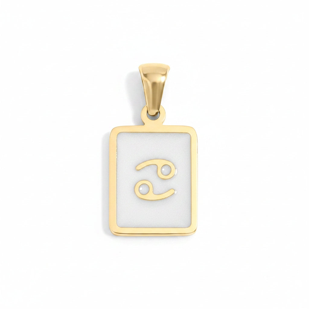 Set of gold pendants with zodiac symbols on a white background
