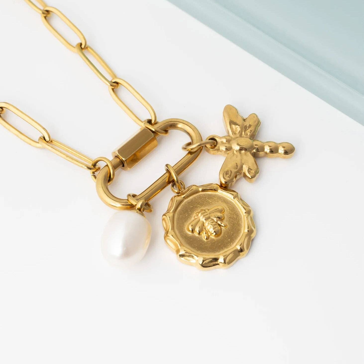 Natural Pearl Charm in Gold